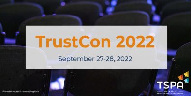 Empty chairs in the background and event info in the foreground