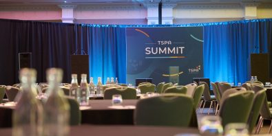 Photo of ballroom with TSPA Summit banner.