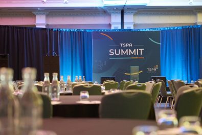 Photo of ballroom with TSPA Summit banner.